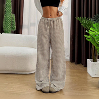 REVELLE™ - Striped Palazzo Trousers